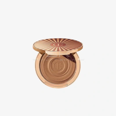 טען תמונה 1 בתצוגת גלריה. Charlotte Tilbury | ברונזר קרמי עמיד בלחות למראה שזוף "Beautiful Skin Sun-Kissed Glow"