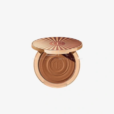 Charlotte Tilbury | ברונזר קרמי עמיד בלחות למראה שזוף "Beautiful Skin Sun-Kissed Glow"